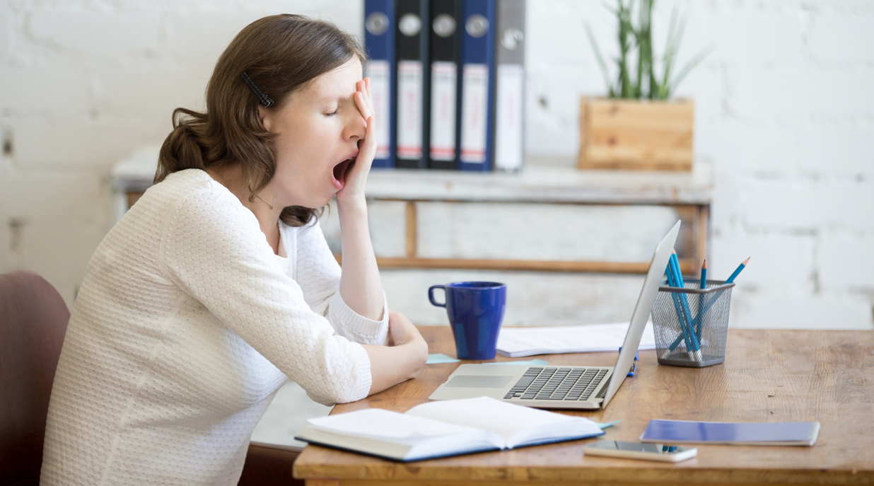 Dear Teens: Don't Forget To Sleep Sleepy young woman yawning.