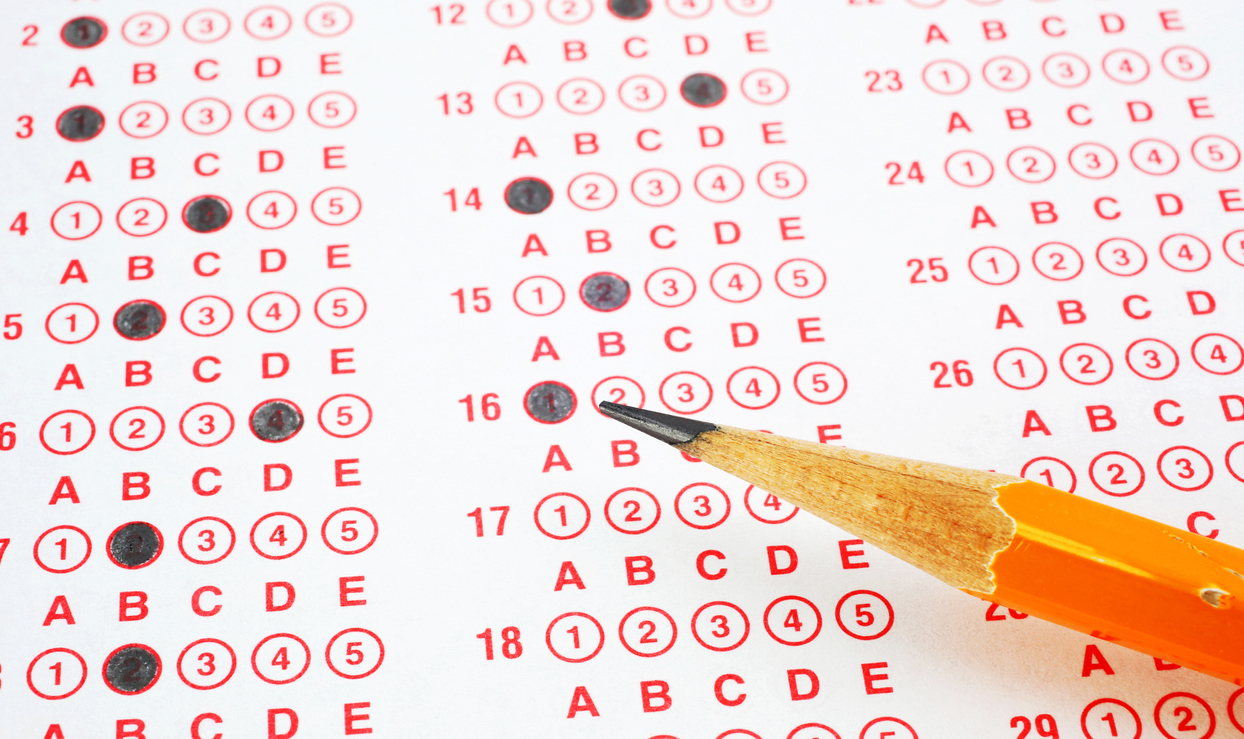Why Test-Optional Colleges Skip the ACT and SAT pencil and SAT answer sheet
